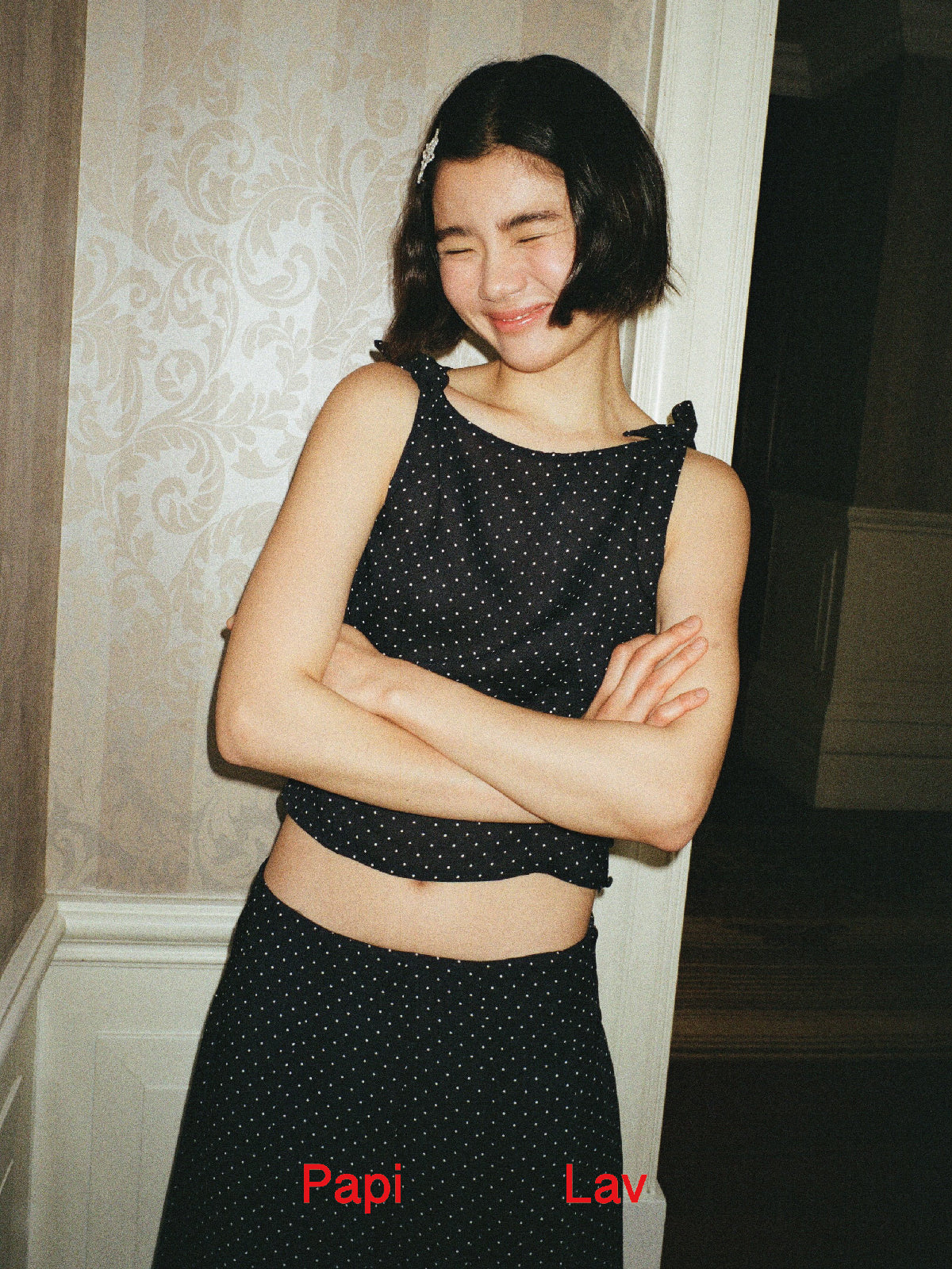 NAVY POLKA DOT ROSY TOP