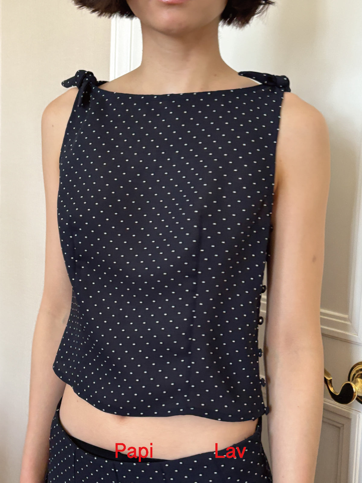 NAVY POLKA DOT ROSY TOP