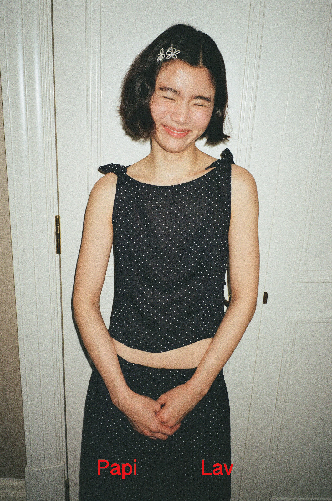 NAVY POLKA DOT ROSY TOP